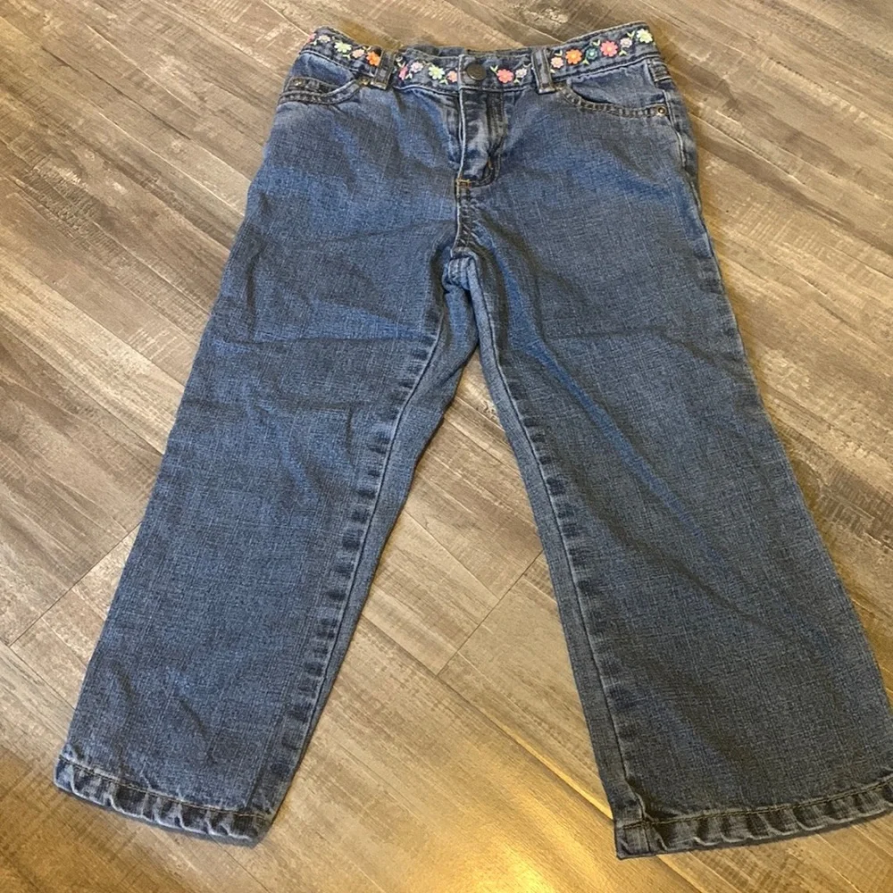 Carter’s girls jeans with embroidered flower waistband. size 4t
